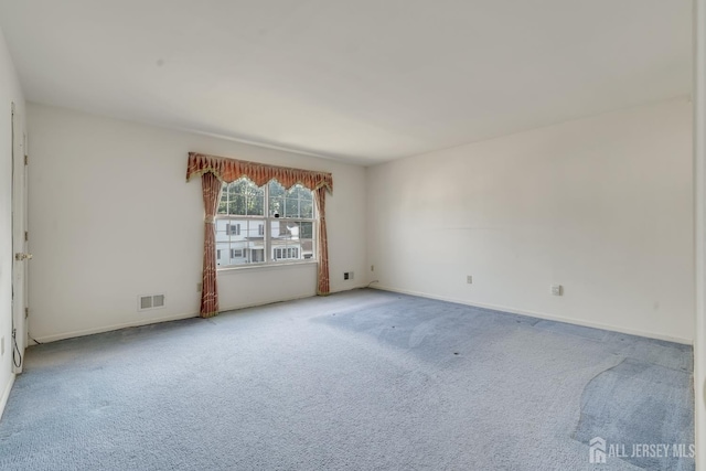 136 Carroll Ave, Woodbridge Proper, NJ 07095 - carpeted empty room featuring baseboards