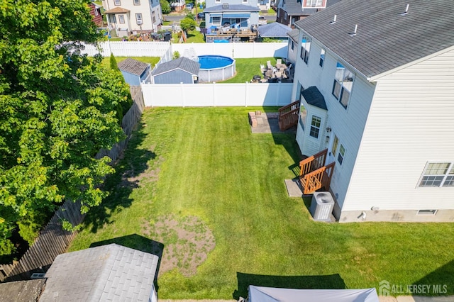 136 Carroll Ave, Woodbridge Proper, NJ 07095 - aerial perspective of suburban area featuring a pool area