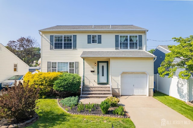 136 Carroll Ave, Woodbridge Proper, NJ 07095 - traditional home featuring a garage and driveway