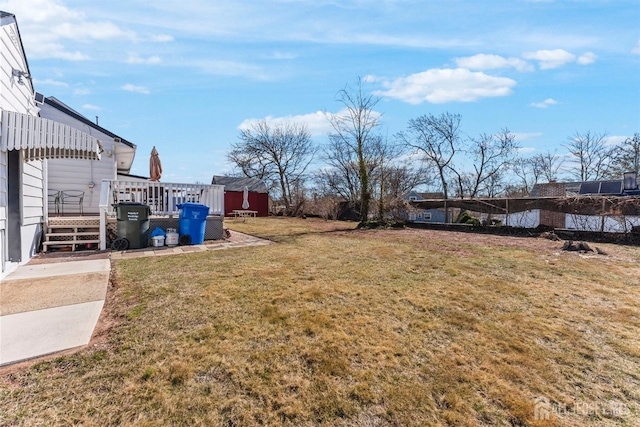 view of yard with a deck