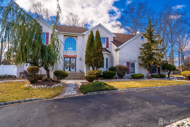 view of property with a lawn