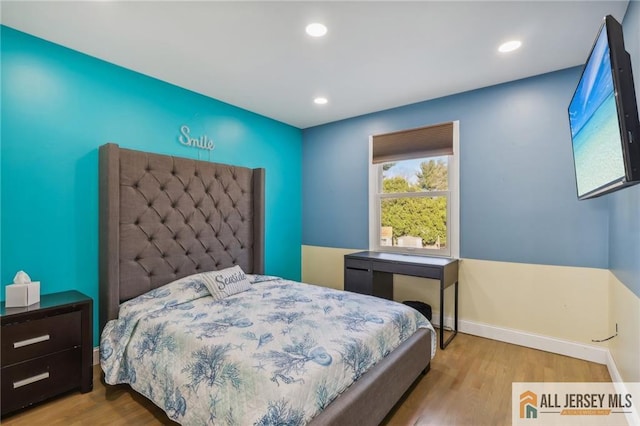 bedroom featuring light hardwood / wood-style flooring