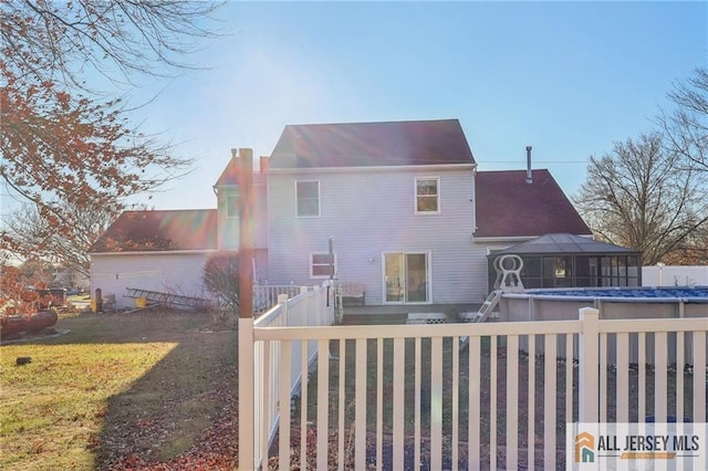 321 Snowgoose Ln, Harrison, NJ 08062 - rear view of house with a fenced backyard and a gazebo