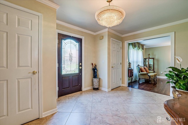 4 Hollis Rd, East Brunswick, NJ 08816 - entrance foyer with plenty of natural light, a chandelier, and crown molding