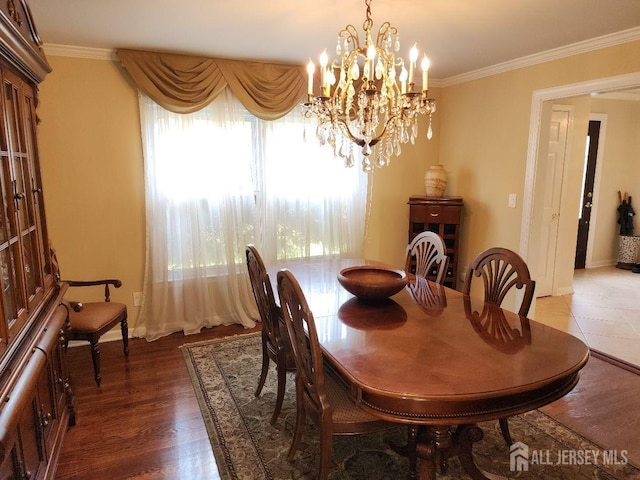 4 Hollis Rd, East Brunswick, NJ 08816 - dining room with a chandelier, crown molding, and wood finished floors