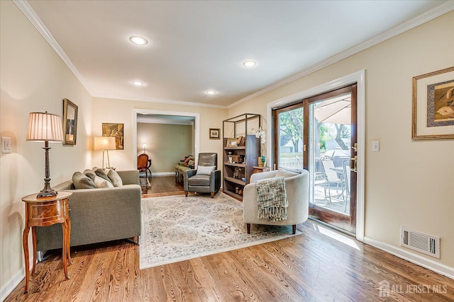 4 Hollis Rd, East Brunswick, NJ 08816 - living area featuring ornamental molding, light wood-type flooring, and recessed lighting