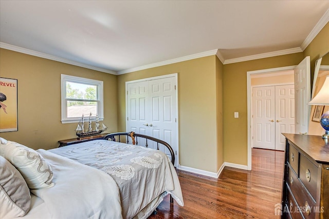 4 Hollis Rd, East Brunswick, NJ 08816 - bedroom with dark wood-type flooring, ornamental molding, and a closet