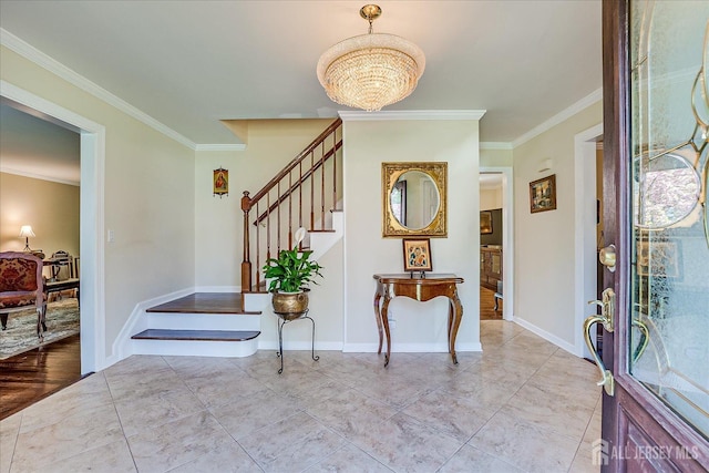 4 Hollis Rd, East Brunswick, NJ 08816 - entryway with stairs, ornamental molding, and a chandelier