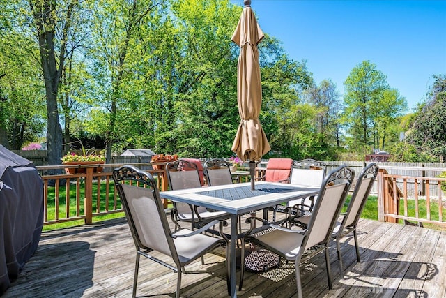 4 Hollis Rd, East Brunswick, NJ 08816 - wooden deck with outdoor dining space, a fenced backyard, and grilling area