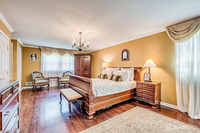 4 Hollis Rd, East Brunswick, NJ 08816 - bedroom featuring a chandelier, dark wood-type flooring, and crown molding