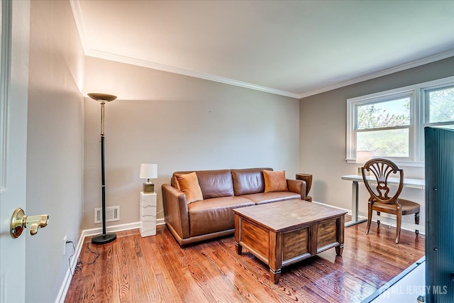 4 Hollis Rd, East Brunswick, NJ 08816 - living room featuring wood finished floors and crown molding