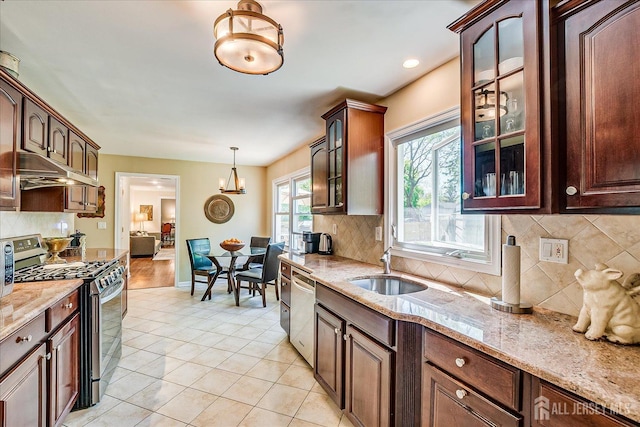 4 Hollis Rd, East Brunswick, NJ 08816 - kitchen featuring appliances with stainless steel finishes, glass insert cabinets, and decorative backsplash