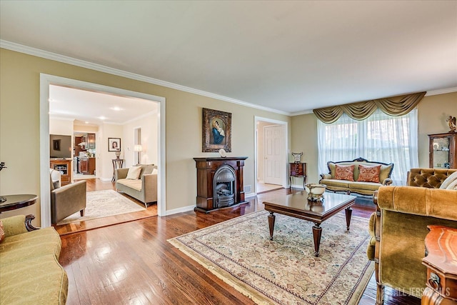 4 Hollis Rd, East Brunswick, NJ 08816 - living room featuring a fireplace, wood finished floors, and ornamental molding