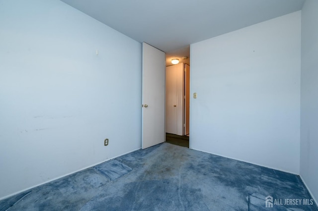 empty room with carpet floors