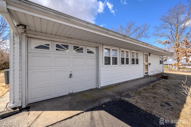 garage featuring central AC unit