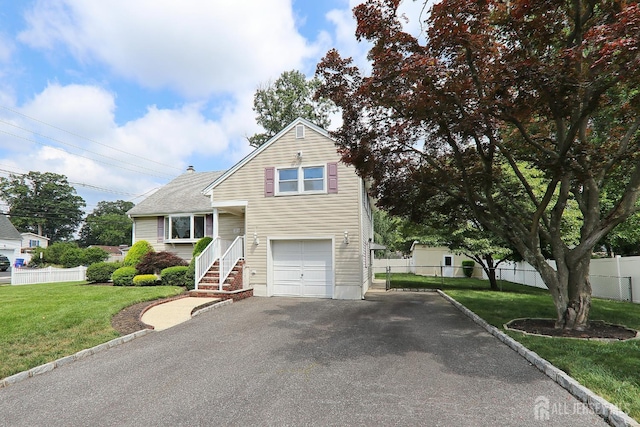 1270 S 9th St S, South Plainfield, NJ 07080 - view of front of property featuring an attached garage and driveway