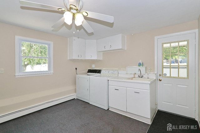 1270 S 9th St S, South Plainfield, NJ 07080 - washroom with washer and clothes dryer, cabinet space, healthy amount of natural light, and a baseboard radiator