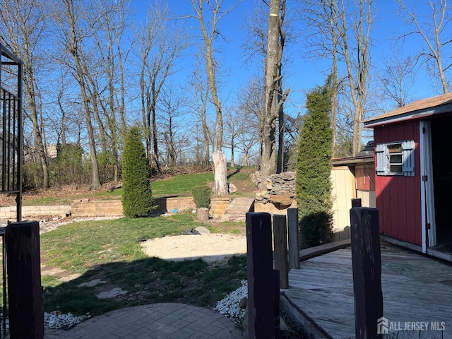 view of yard with a deck