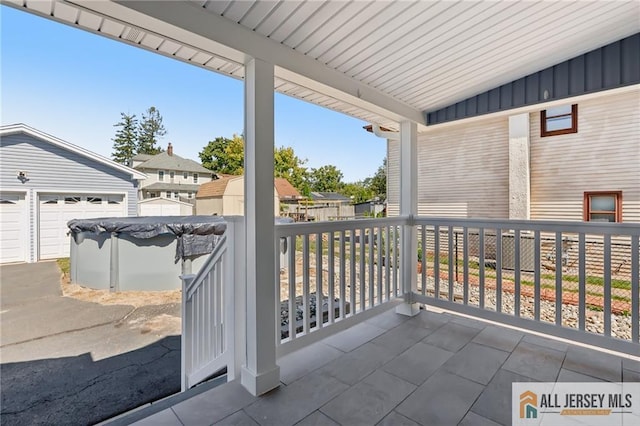 view of patio / terrace with a fenced in pool