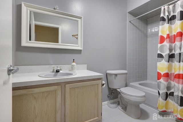 bathroom with vanity, shower / tub combo with curtain, toilet, and tile patterned flooring