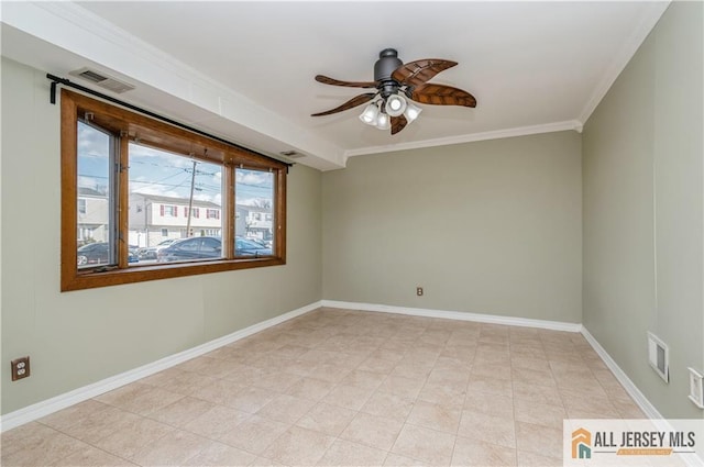 empty room with baseboards, visible vents, ornamental molding, and ceiling fan