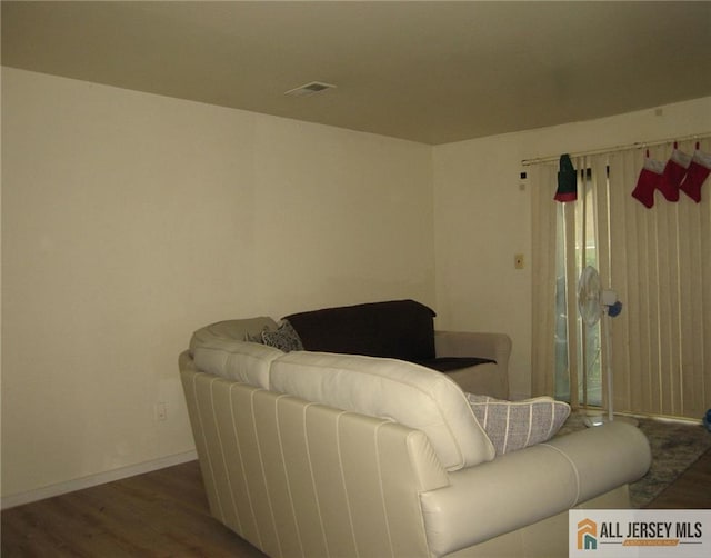 903 N Oaks Blvd, North Brunswick, NJ 08902 - living area with wood finished floors and baseboards