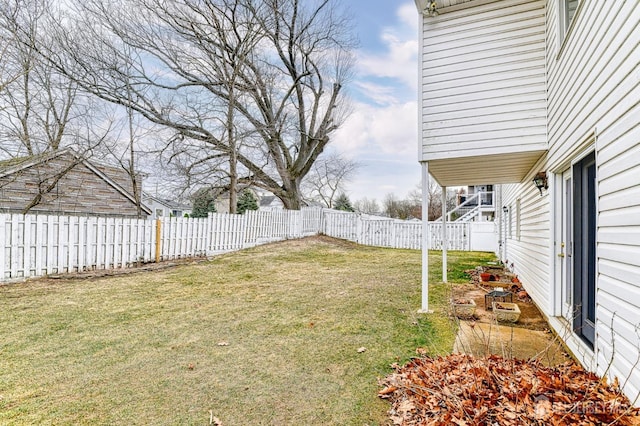 view of yard featuring a fenced backyard