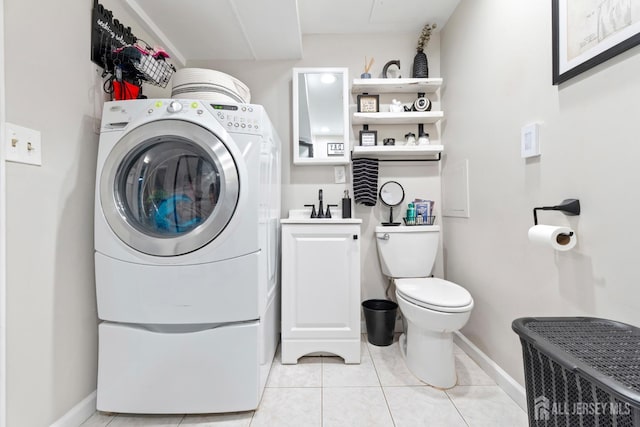 27 York St, Old Bridge, NJ 08857 - laundry room featuring washer / clothes dryer and light tile patterned floors