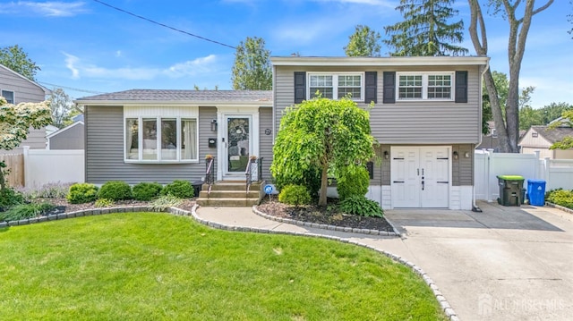 27 York St, Old Bridge, NJ 08857 - tri-level home featuring concrete driveway
