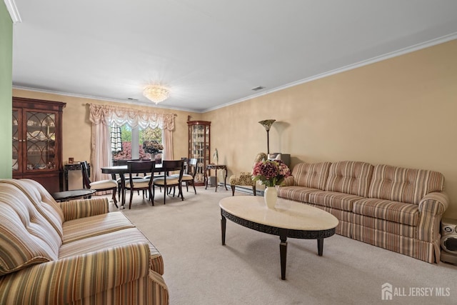living room featuring carpet and crown molding