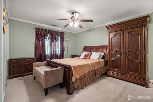 bedroom with light carpet, ornamental molding, and ceiling fan