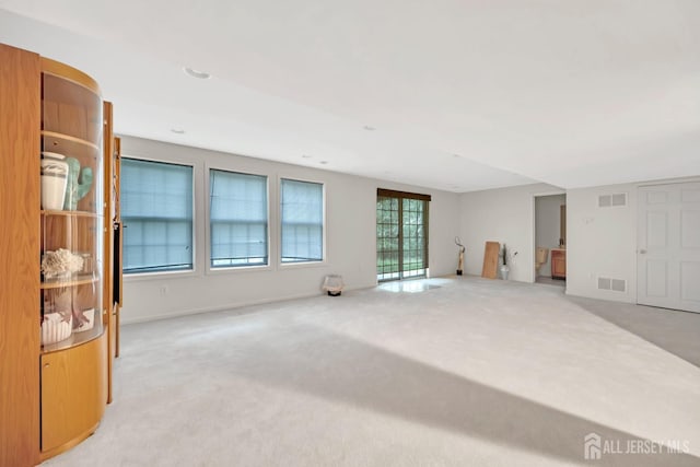 37 Walden Ct, Old Bridge, NJ 08857 - unfurnished living room featuring light colored carpet