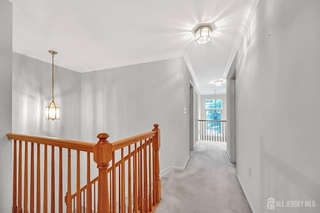 37 Walden Ct, Old Bridge, NJ 08857 - corridor featuring an upstairs landing, light carpet, ornamental molding, baseboards, and a chandelier