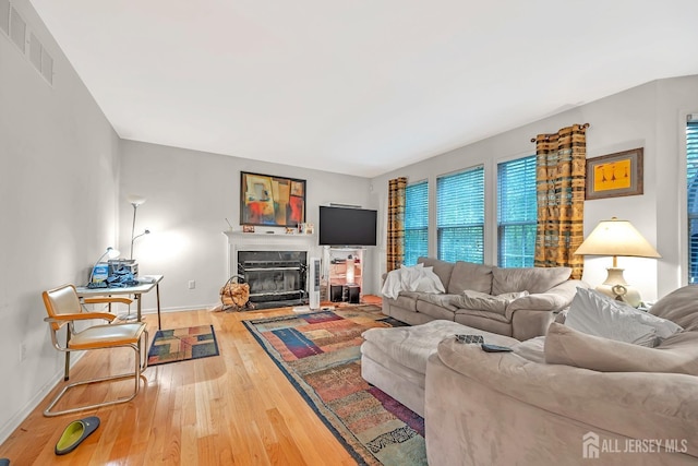 37 Walden Ct, Old Bridge, NJ 08857 - living room featuring hardwood / wood-style flooring, baseboards, and a fireplace with flush hearth