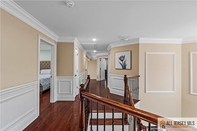 153 Scarborough Rd, Montgomery, NJ 08502 - hallway with an upstairs landing, ornamental molding, dark wood finished floors, wainscoting, and recessed lighting