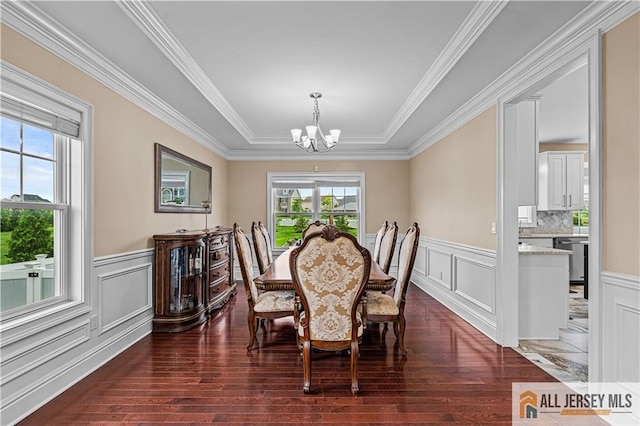 153 Scarborough Rd, Montgomery, NJ 08502 - dining room with a chandelier, hardwood / wood-style floors, wainscoting, a decorative wall, and crown molding