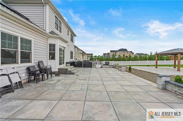 153 Scarborough Rd, Montgomery, NJ 08502 - fenced backyard with a gazebo and a patio area
