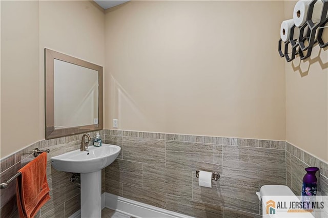153 Scarborough Rd, Montgomery, NJ 08502 - bathroom featuring tile walls, a wainscoted wall, and toilet