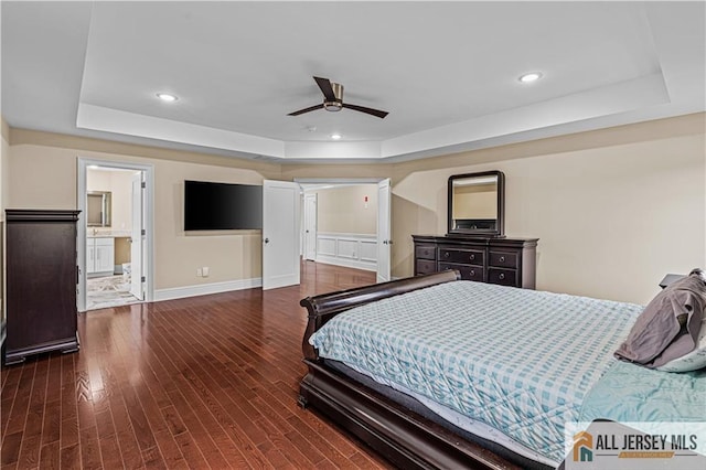 153 Scarborough Rd, Montgomery, NJ 08502 - bedroom with a tray ceiling, wood finished floors, baseboards, and a ceiling fan