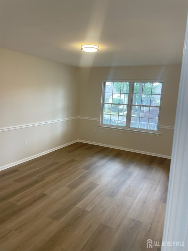 218 N Pondview Blvd, Monroe, NJ 08831 - spare room with wood finished floors and baseboards