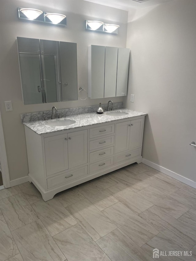 218 N Pondview Blvd, Monroe, NJ 08831 - full bath featuring double vanity and marble look tiles