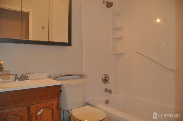 full bathroom with vanity, toilet, and shower / washtub combination