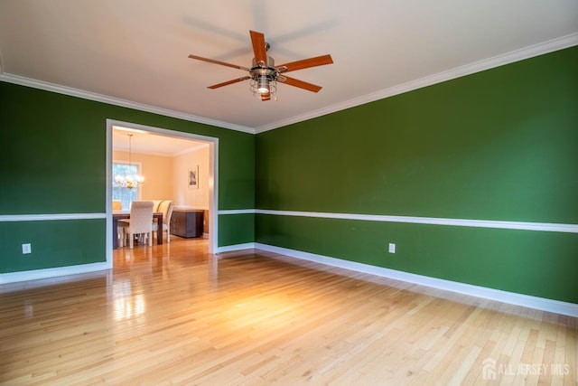 13 Carnegie St, Monroe, NJ 08831 - unfurnished room with a chandelier, wood finished floors, ornamental molding, and ceiling fan