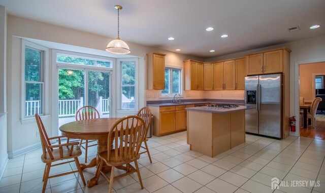 13 Carnegie St, Monroe, NJ 08831 - kitchen featuring stainless steel fridge, a center island, recessed lighting, light tile patterned floors, and light brown cabinets
