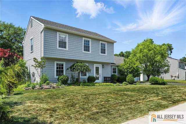 1072 Lake Placid Dr, Toms River, NJ 08753 - colonial house with a front lawn
