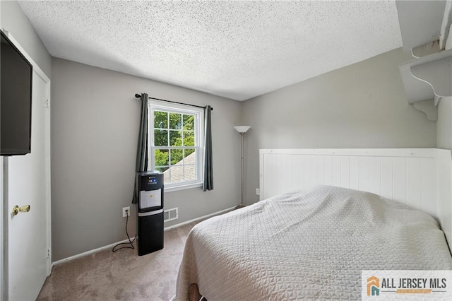 1072 Lake Placid Dr, Toms River, NJ 08753 - carpeted bedroom with a textured ceiling