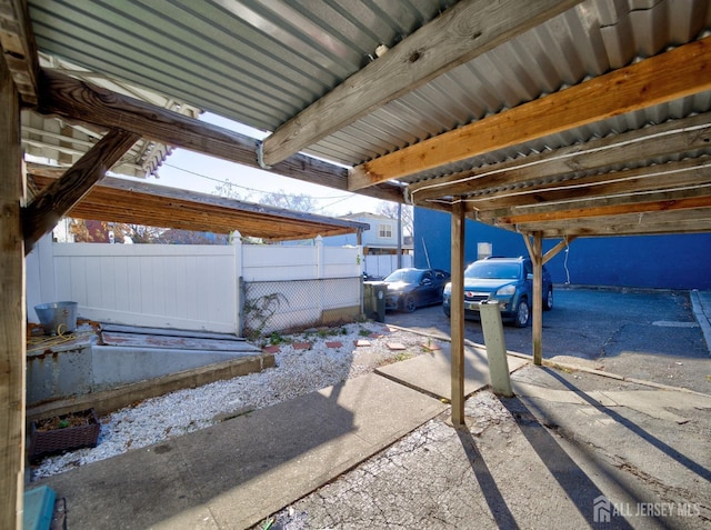view of patio featuring fence