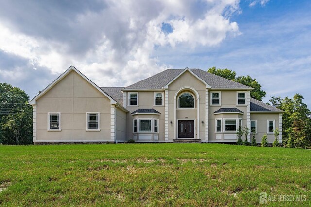 view of front of home with a front yard