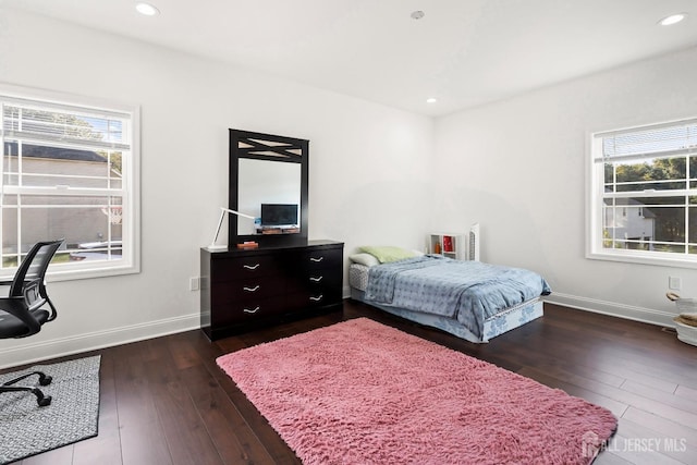 bedroom featuring dark wood-type flooring