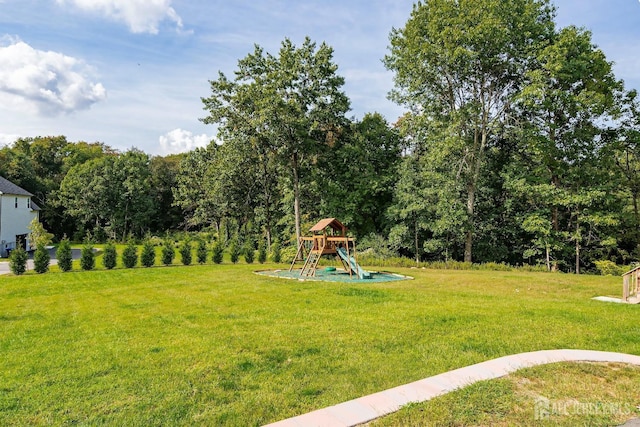 view of yard featuring a playground